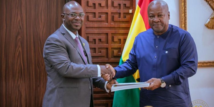 Mr. Constantine K.M. Kudzedzi, with President Mahama